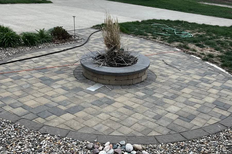 Paver patio built for family gatherings by Larkin Landscape and Design